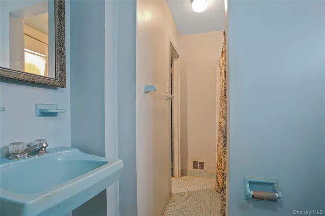 a bathroom with a sink and a tub