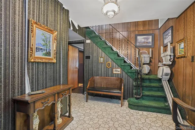 a view of staircase with lots of furniture and stairs