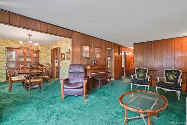 a room with furniture and mountain view