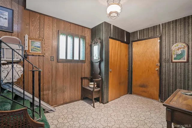 a bedroom with bed and a window