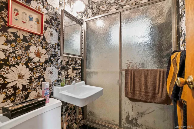 a bathroom with a sink and mirror