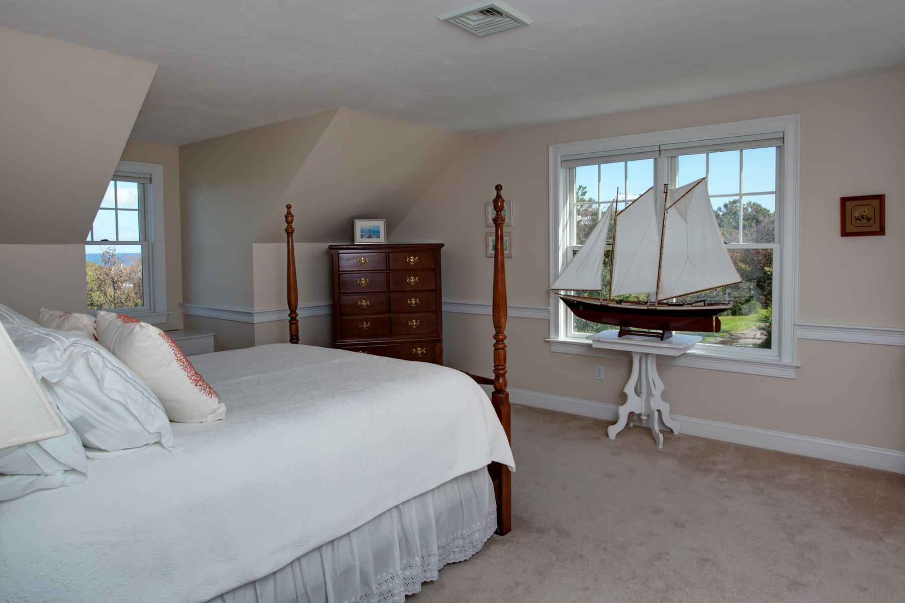 58 Torrey Road East Sandwich, MA 02537 - Photo 20 of 34 a bedroom with a bed and a mirror