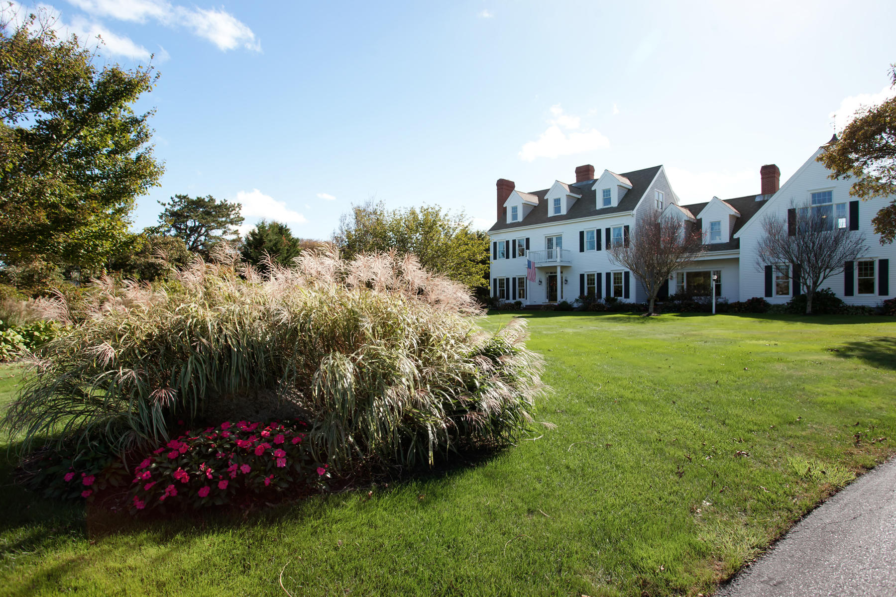 58 Torrey Road East Sandwich, MA 02537 - Photo 2 of 34 a view of a house with a big yard and potted plants