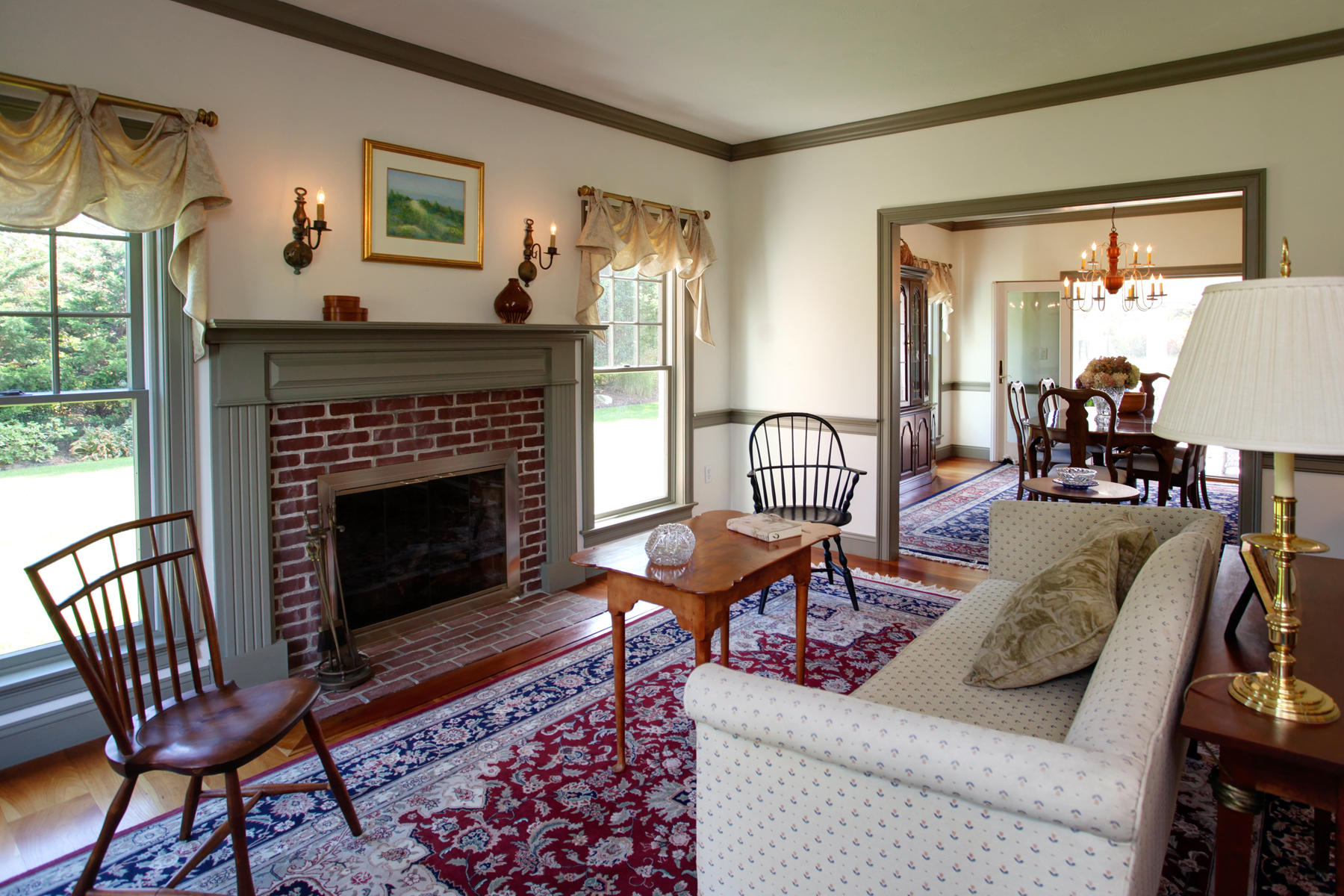 58 Torrey Road East Sandwich, MA 02537 - Photo 7 of 34 a living room with furniture a flat screen tv and a fireplace