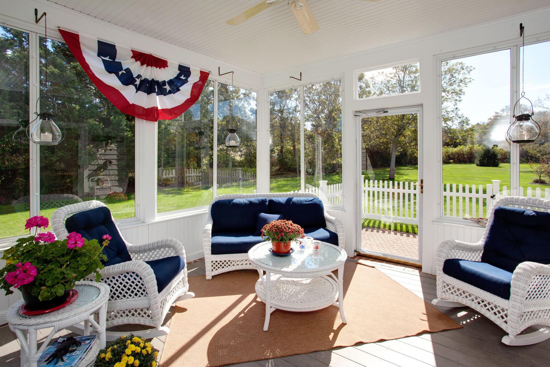 58 Torrey Road East Sandwich, MA 02537 - Photo 9 of 34 a living room with patio furniture and a floor to ceiling window