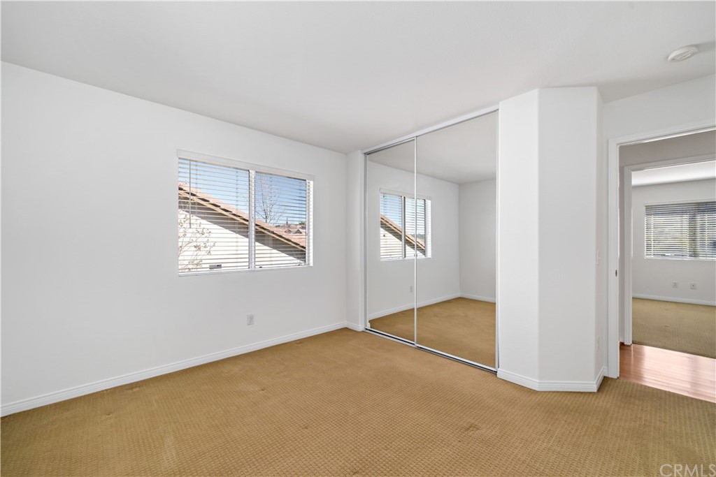 33782 Channel Street Temecula, CA 92592 - Photo 20 of 44 an empty room with windows and closet