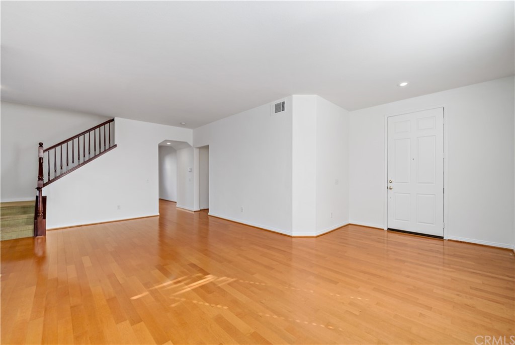 33782 Channel Street Temecula, CA 92592 - Photo 27 of 44 a view of an empty room with wooden floor