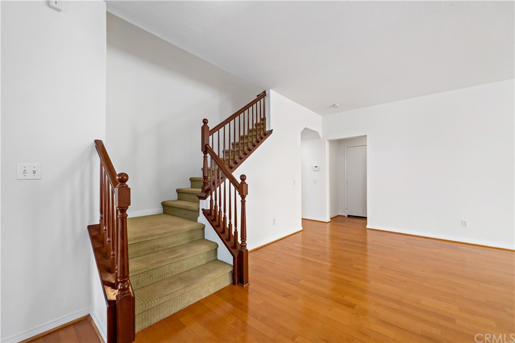33782 Channel Street Temecula, CA 92592 - Photo 29 of 44 a view of entryway and hall with wooden floor