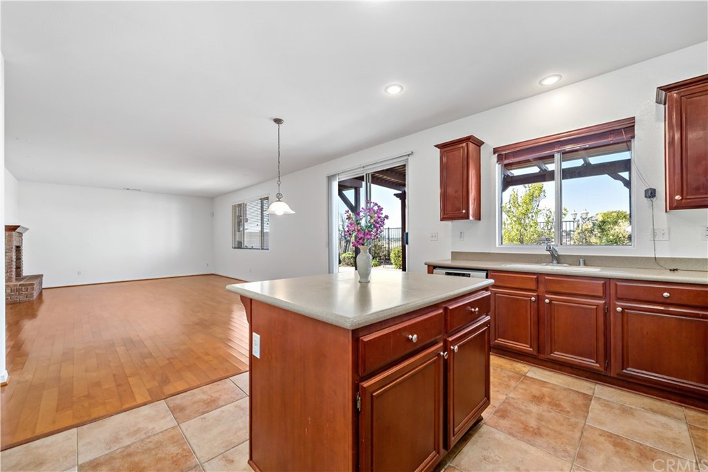 33782 Channel Street Temecula, CA 92592 - Photo 4 of 44 a kitchen with stainless steel appliances granite countertop a sink stove and cabinets