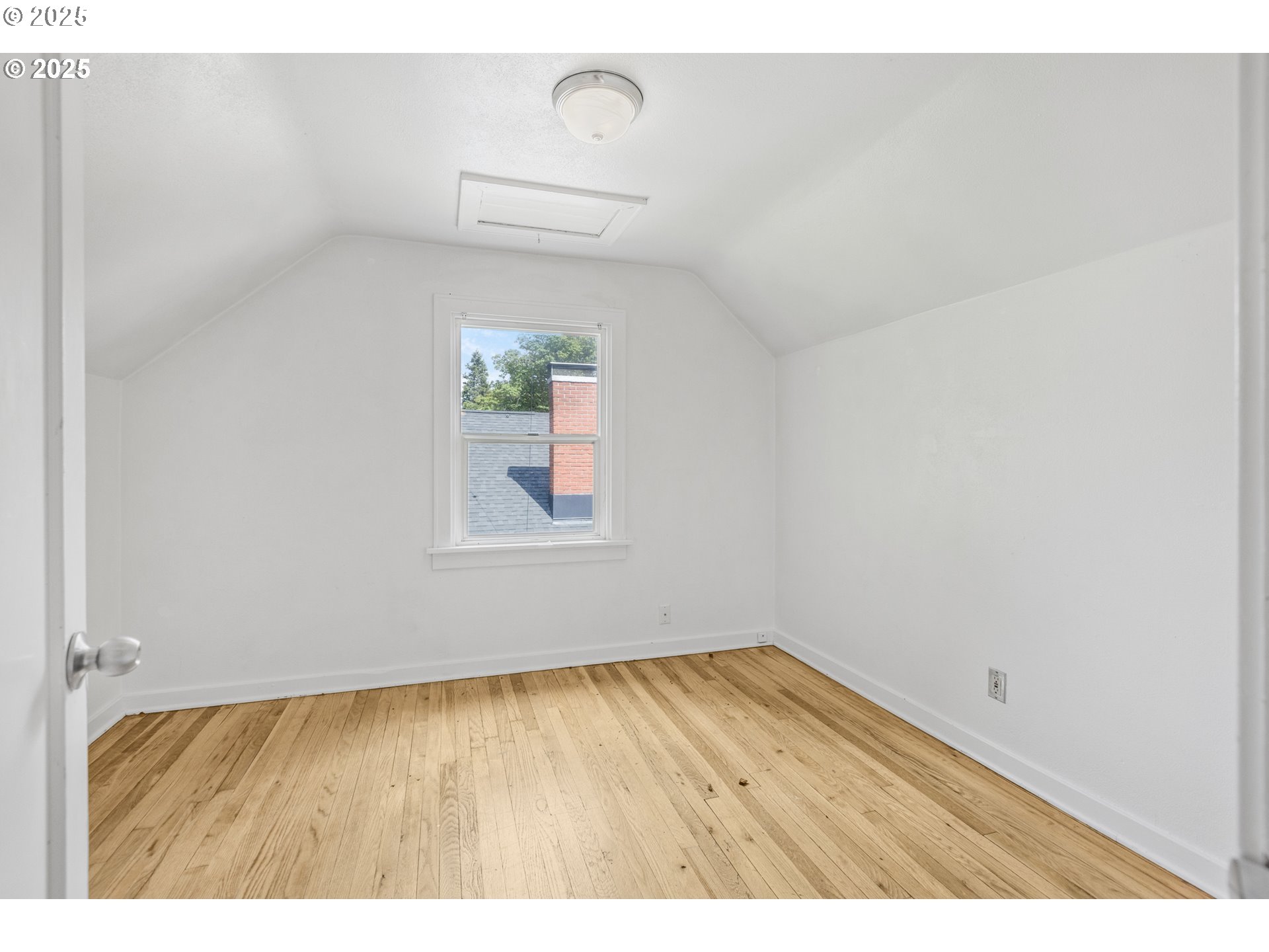 1391 West 5th Avenue Eugene, OR 97402 - Photo 17 of 35 a view of an empty room and window