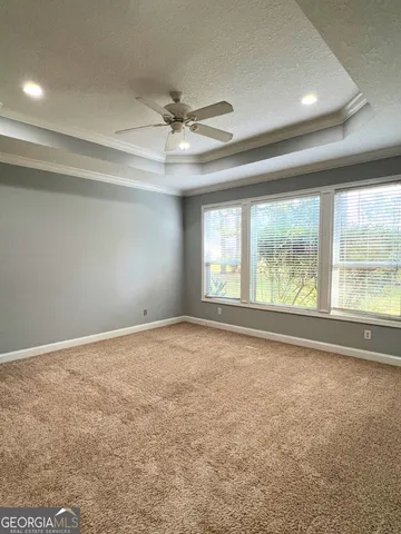 en empty room with windows