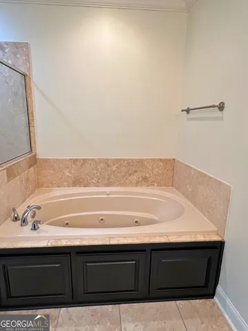a bathroom with a toilet and a sink