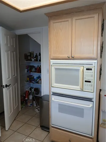 a storage room with washer and dryer