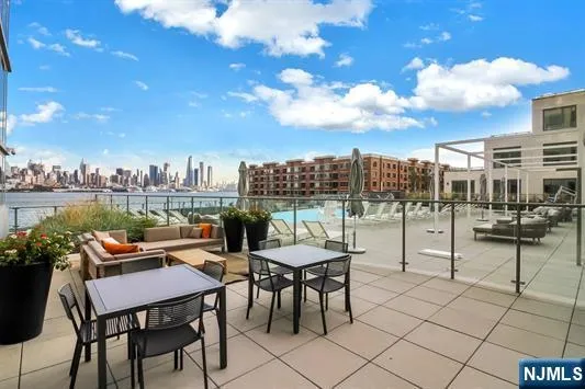 a view of a terrace with furniture and a terrace