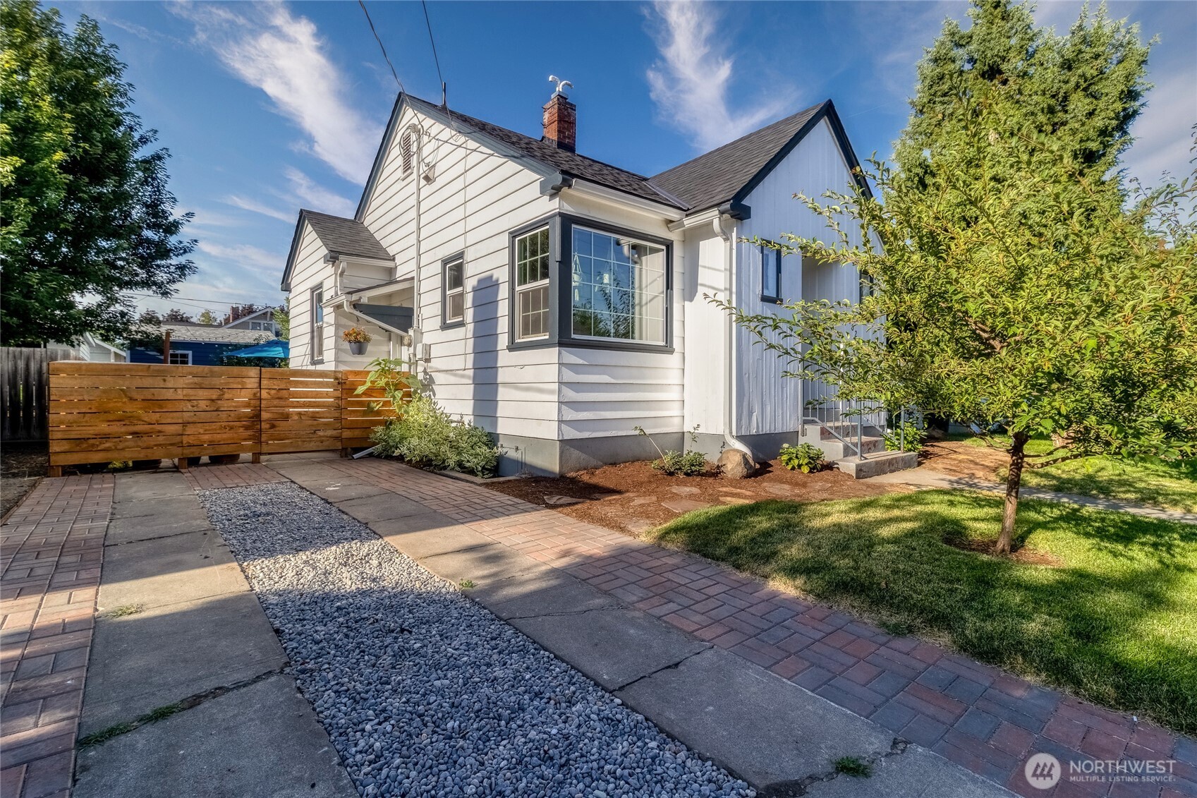 1028 University Street Walla Walla, WA 99362 - Photo 1 of 27 a front view of a house with a yard