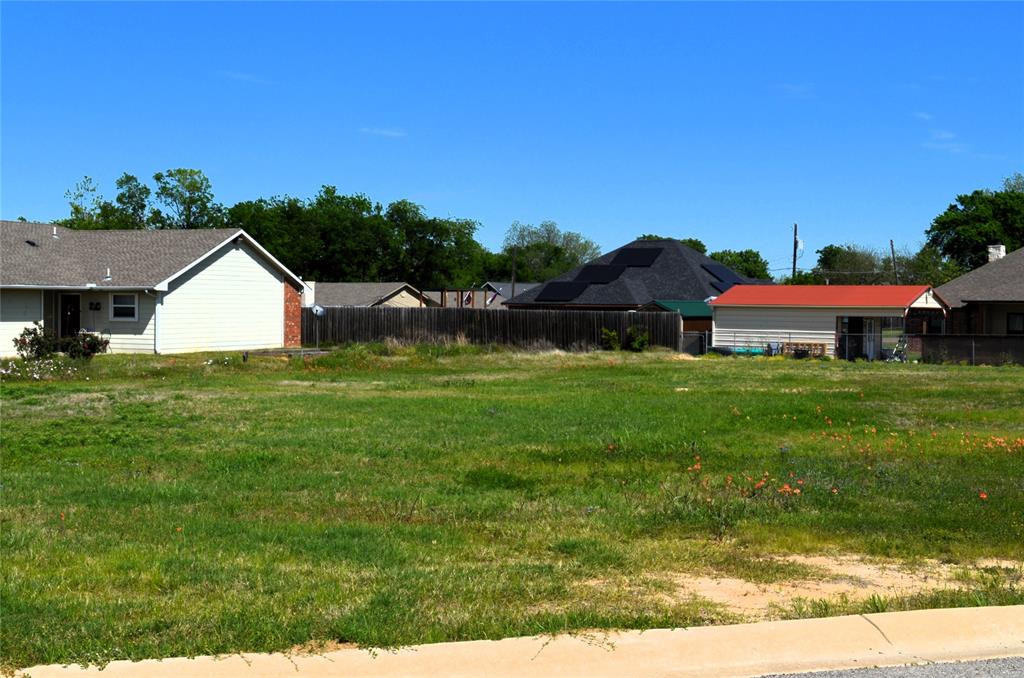 318 Preston Road Mabank, TX 75147 - Photo 3 of 5 a view of a house with a yard