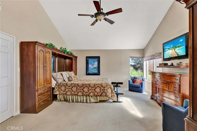 a room with furniture and a flat screen tv