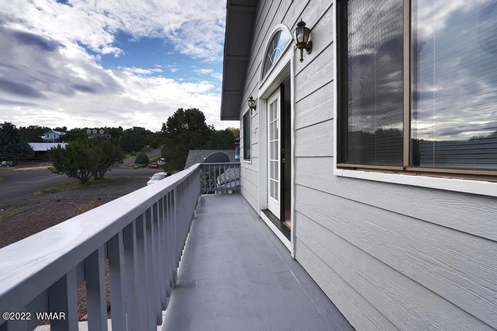 1180 Timberline Drive Eagar, AZ 85925 - Photo 30 of 48 a view of a balcony with a street