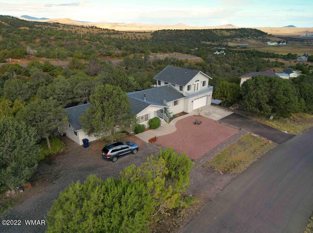 1180 Timberline Drive Eagar, AZ 85925 - Photo 39 of 48 an aerial view of a house with a garden