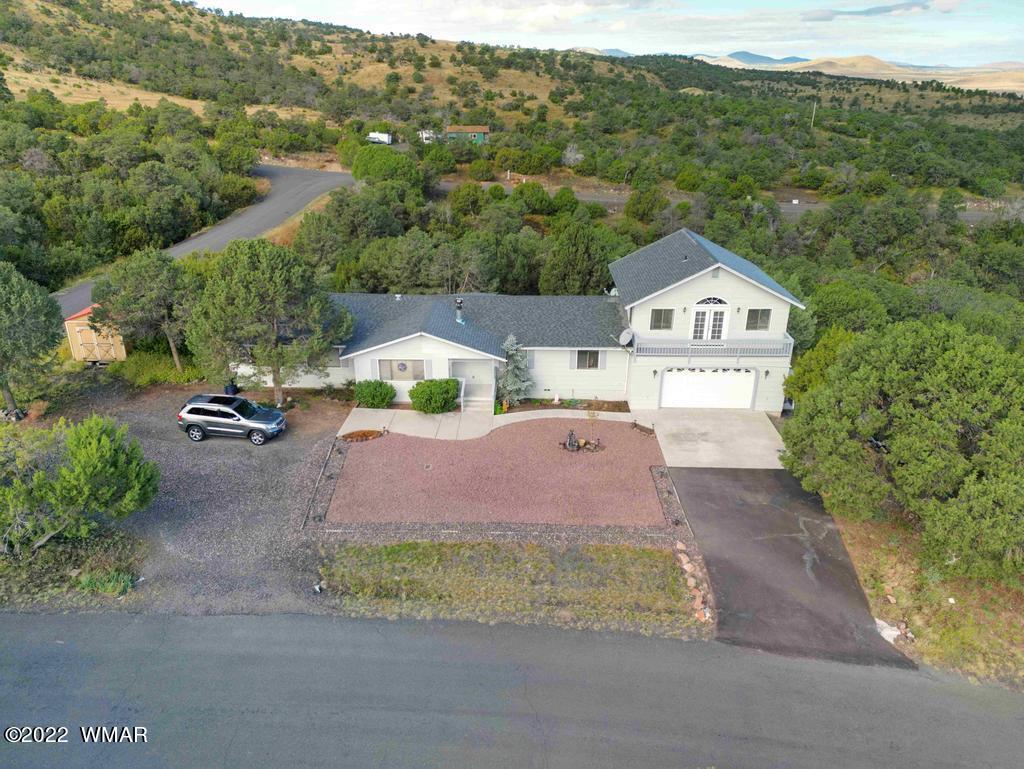 1180 Timberline Drive Eagar, AZ 85925 - Photo 40 of 48 an aerial view of a house with a yard