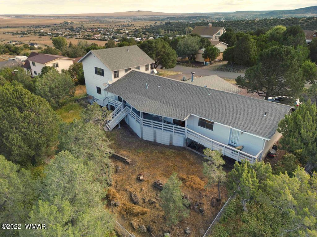 1180 Timberline Drive Eagar, AZ 85925 - Photo 41 of 48 an aerial view of a house with a yard
