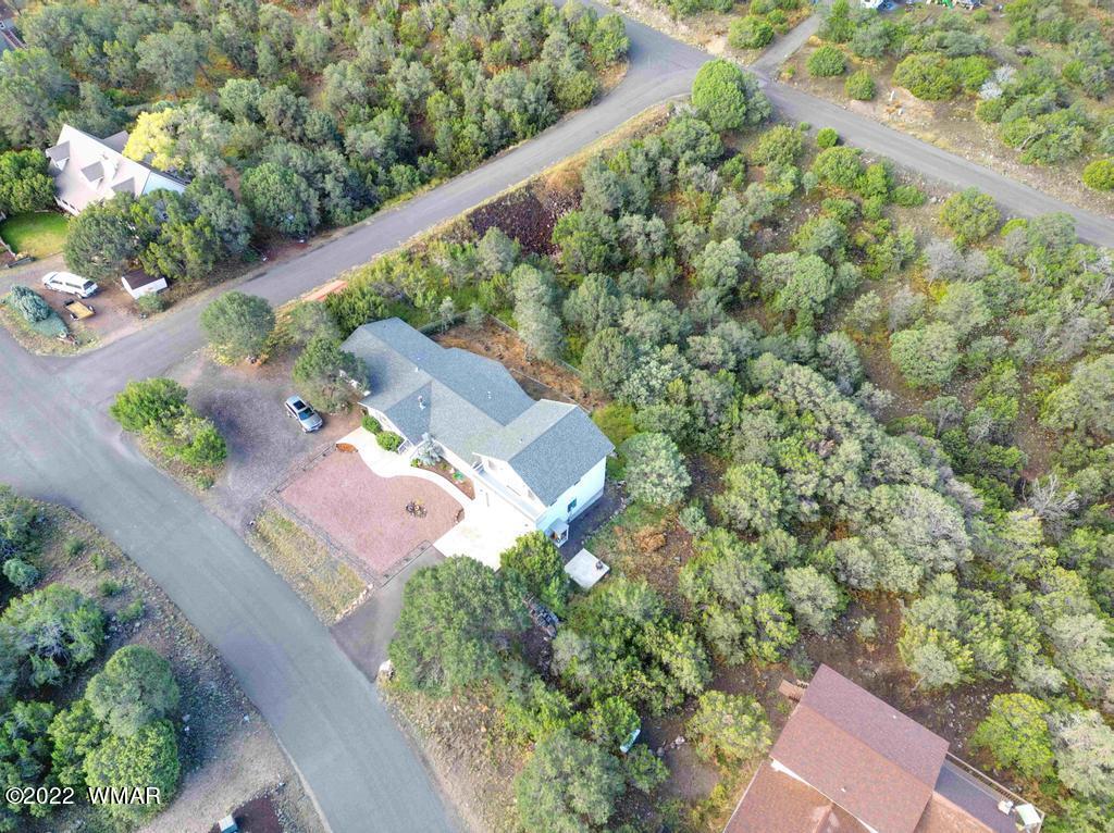 1180 Timberline Drive Eagar, AZ 85925 - Photo 43 of 48 an aerial view of a house with a yard