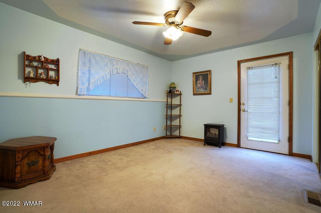 1180 Timberline Drive Eagar, AZ 85925 - Photo 9 of 48 a view of an empty room with a window