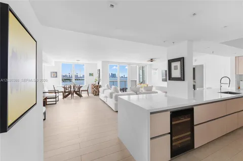 a kitchen with counter top space a sink and cabinets