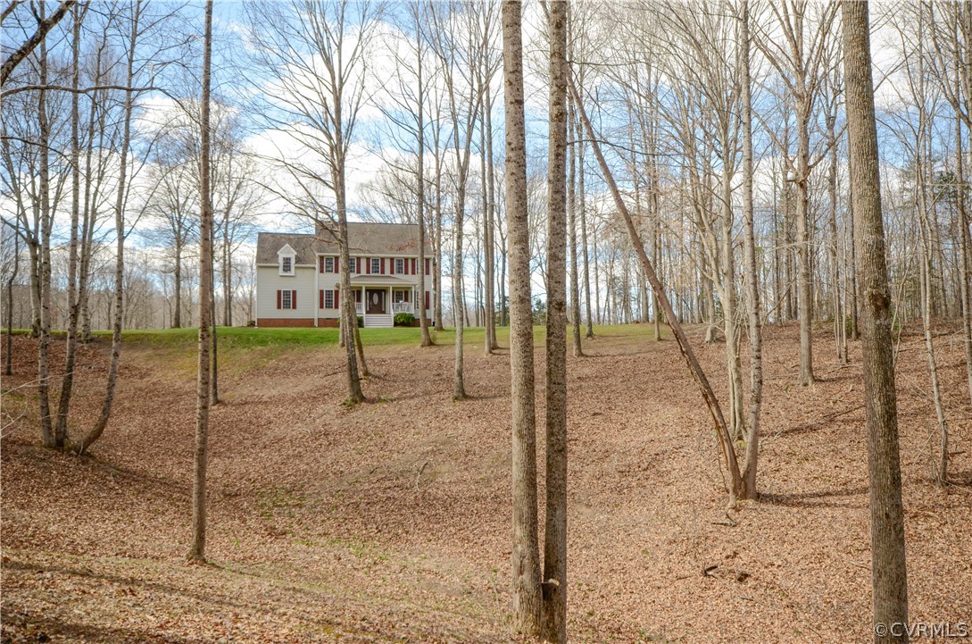 4400 Spring Rock Road Gum Spring, VA 23065 - Photo 2 of 35 a view of a yard with a tree