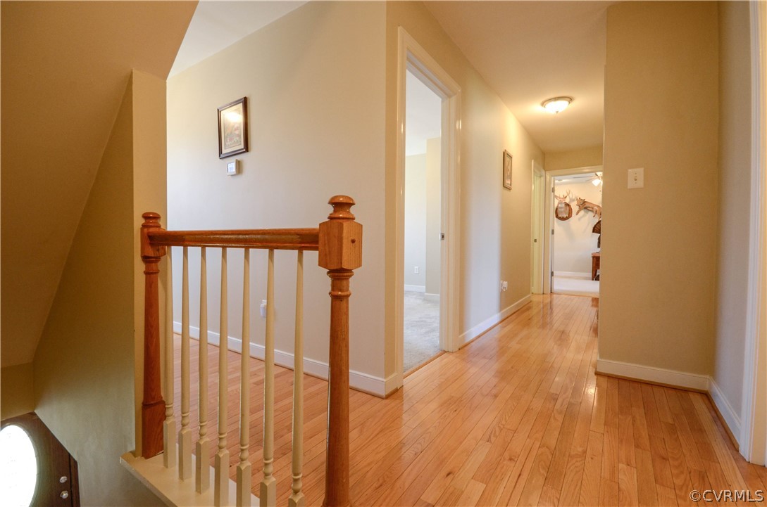 4400 Spring Rock Road Gum Spring, VA 23065 - Photo 30 of 35 a view of a hallway with wooden floor