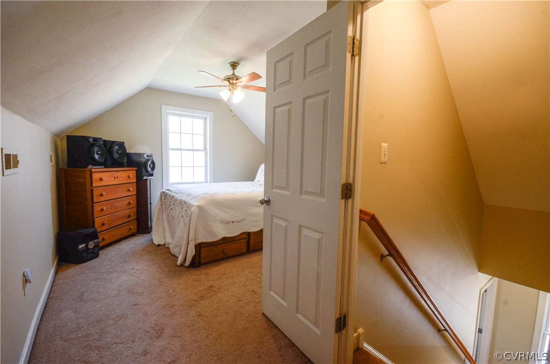 4400 Spring Rock Road Gum Spring, VA 23065 - Photo 31 of 35 a spacious bedroom with a bed and a window