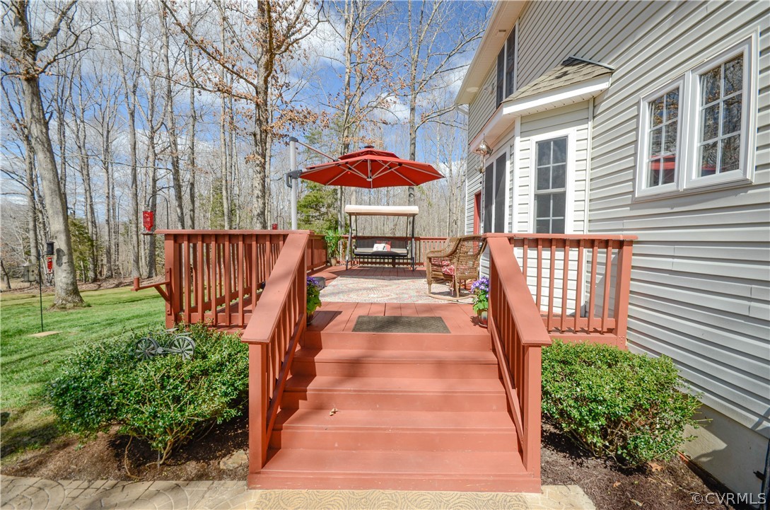 4400 Spring Rock Road Gum Spring, VA 23065 - Photo 4 of 35 a view of a patio with chairs and potted plants