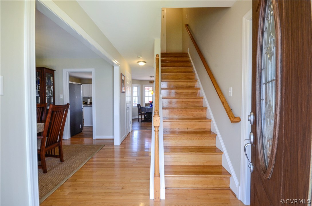 4400 Spring Rock Road Gum Spring, VA 23065 - Photo 7 of 35 a view of entryway and hall with wooden floor