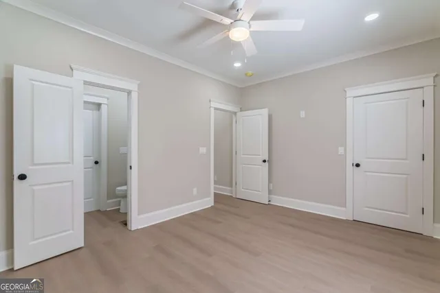 a view of balcony with wooden floor