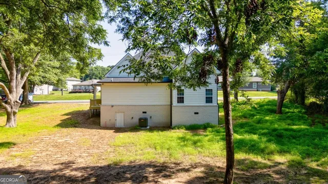 an aerial view of a town with couple of houses