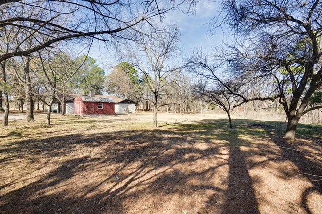 a view of road with trees