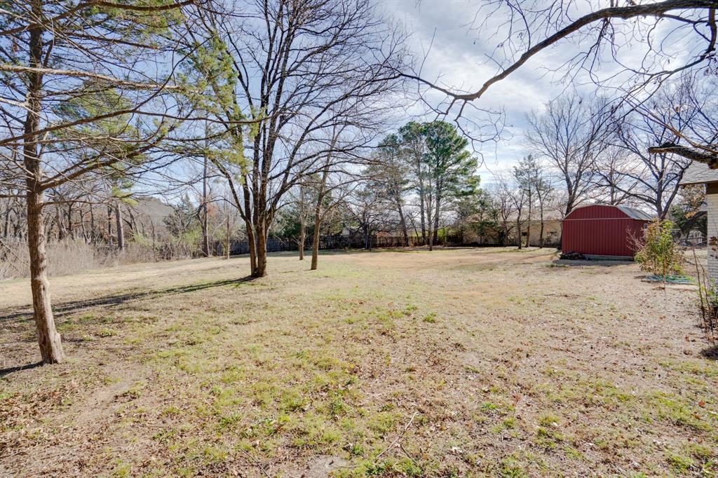 890 Copper Canyon Road Copper Canyon, TX 76226 - Photo 34 of 37 a view of yard covered with snow in front of house