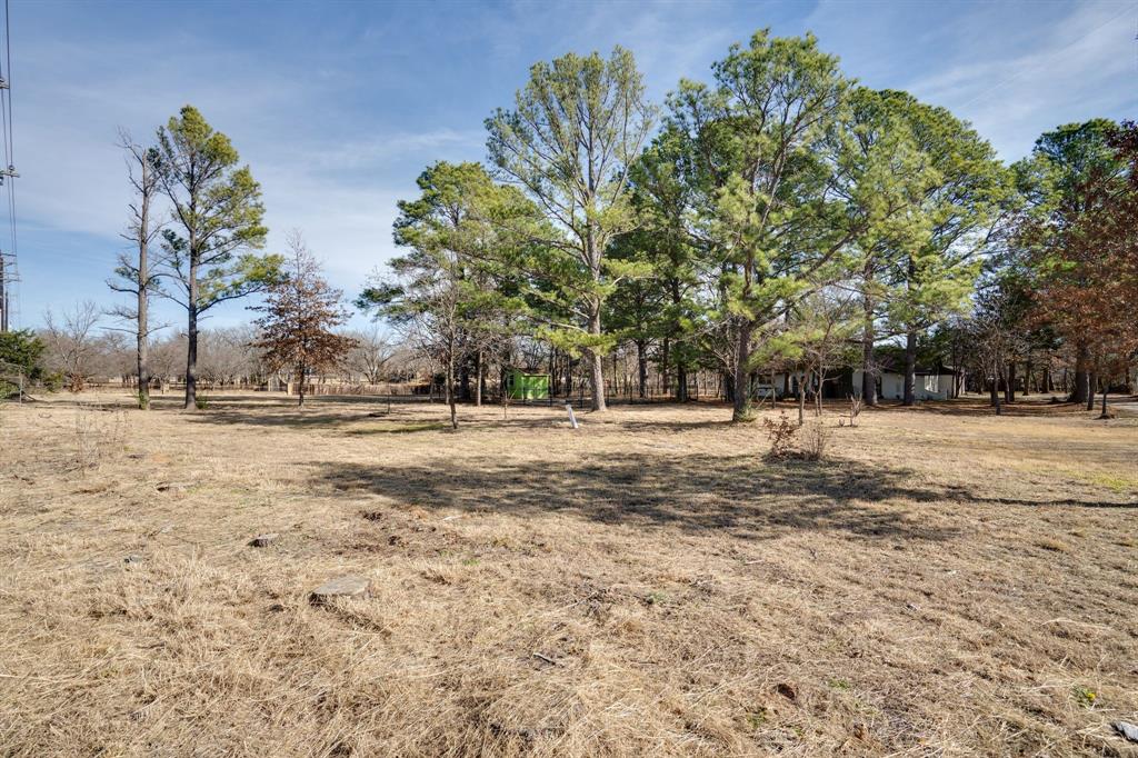 890 Copper Canyon Road Copper Canyon, TX 76226 - Photo 4 of 37 a view of outdoor space with trees