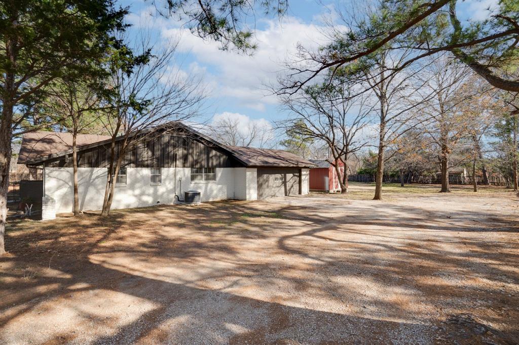 890 Copper Canyon Road Copper Canyon, TX 76226 - Photo 9 of 37 a view of road with trees
