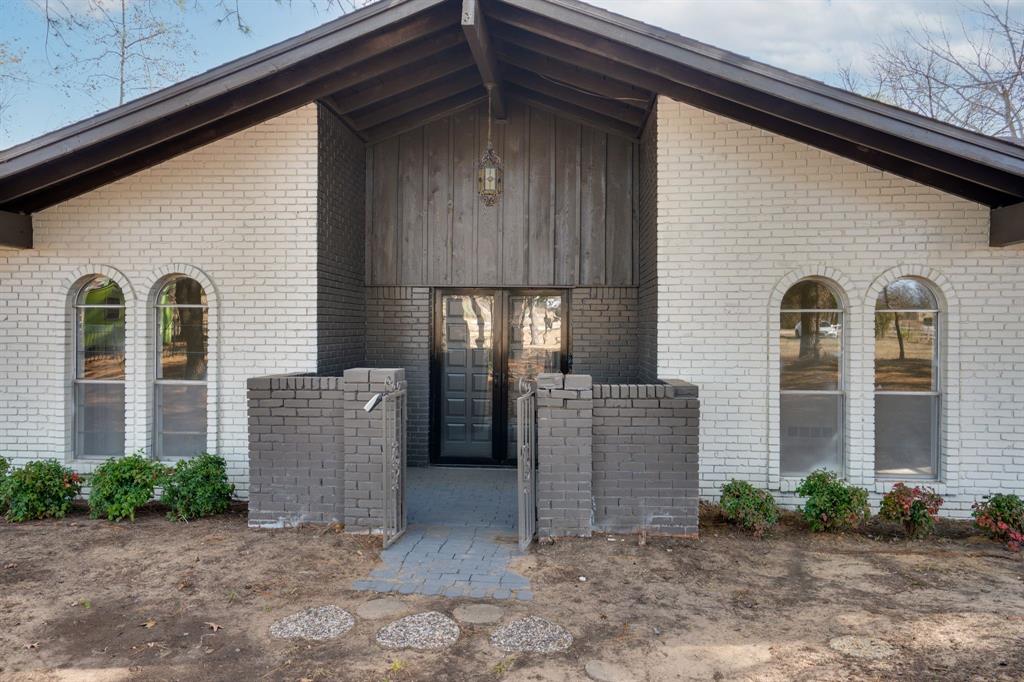 890 Copper Canyon Road Copper Canyon, TX 76226 - Photo 10 of 37 a view of a house with a yard