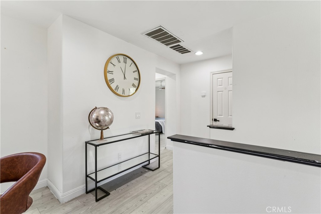 4155 Windspring Street Corona, CA 92883 - Photo 20 of 38 a view of a hallway with elevator