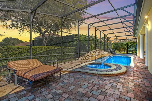 a view of a patio with a table chairs and a table