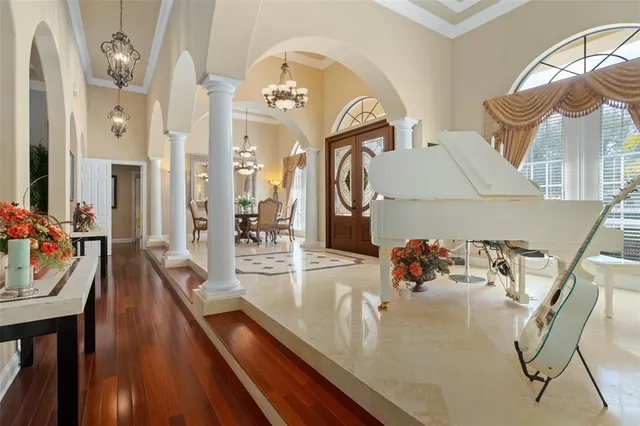 a view of a living room and dining room