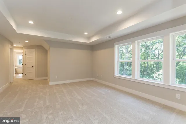 an empty room with a bathroom