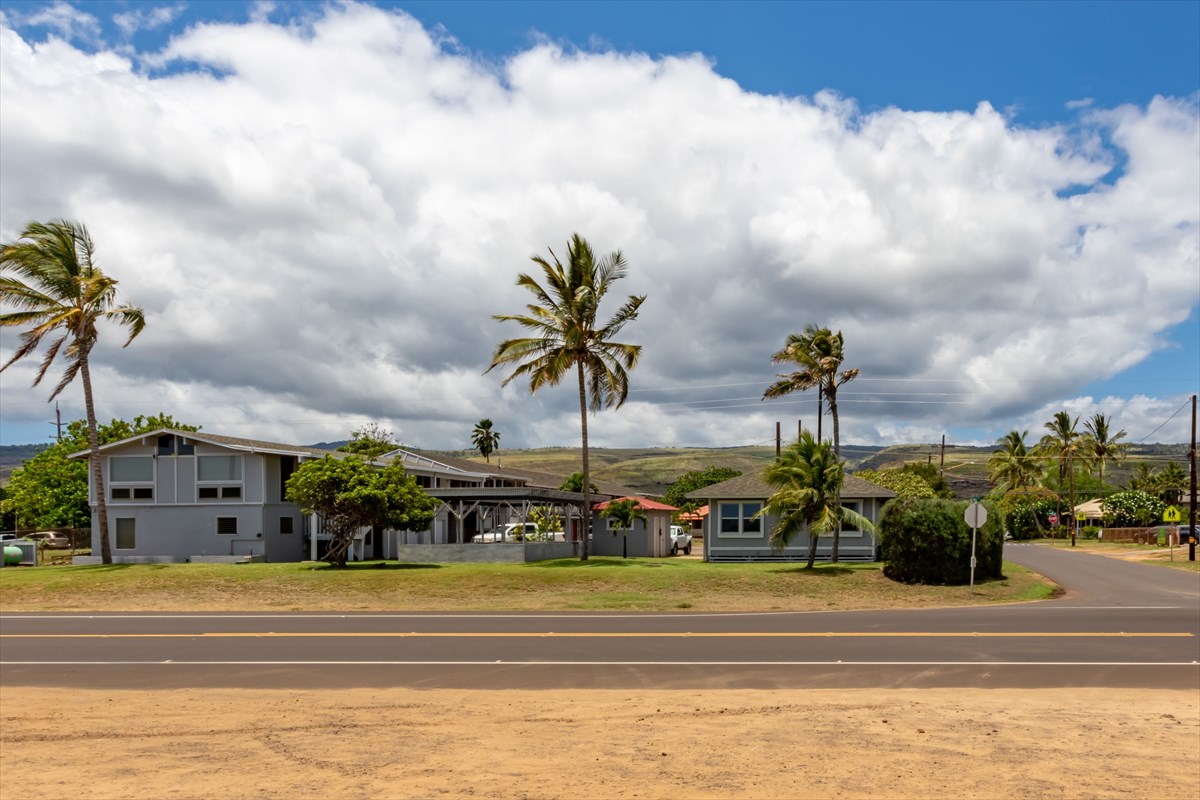 4517 Kala Road Kekaha, HI 96752 - Photo 12 of 19 a view of a fountain with a big white house in front of it