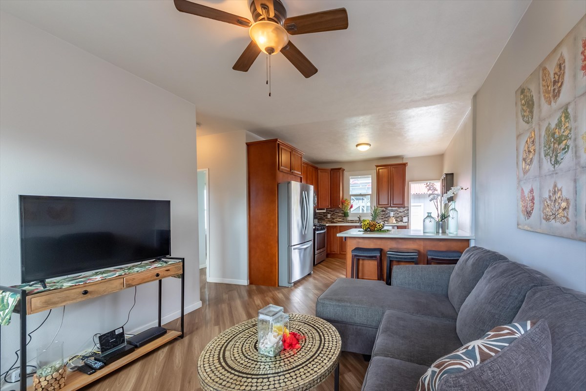 4517 Kala Road Kekaha, HI 96752 - Photo 5 of 19 a living room with furniture and a flat screen tv