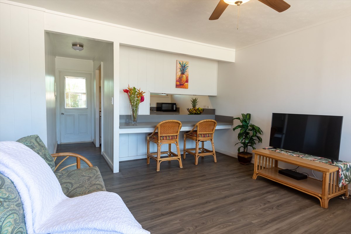 4517 Kala Road Kekaha, HI 96752 - Photo 8 of 19 a living room with furniture and a flat screen tv