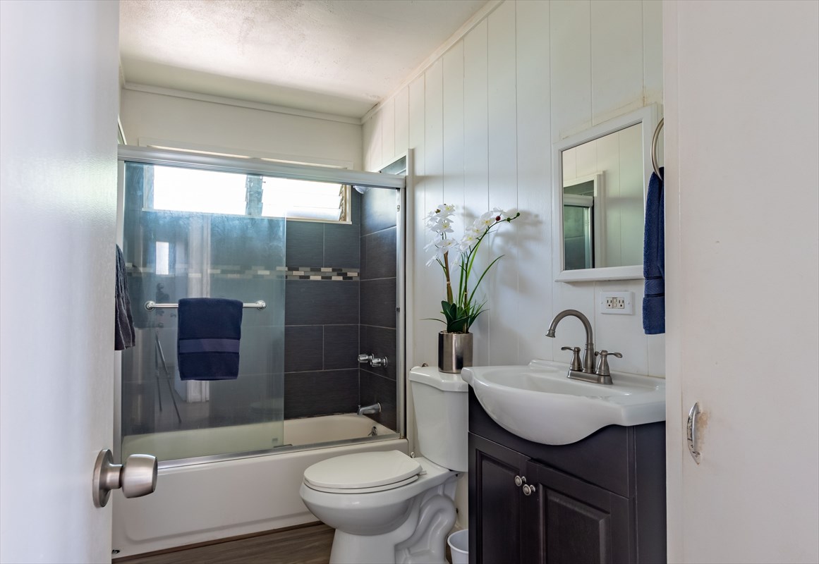 4517 Kala Road Kekaha, HI 96752 - Photo 10 of 19 a bathroom with a sink toilet and shower