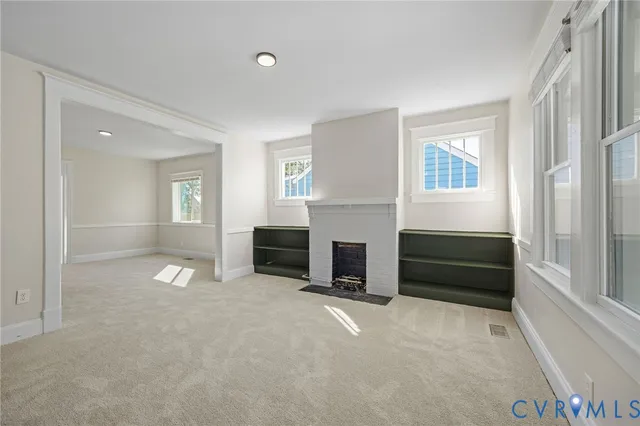 a view of a livingroom with a fireplace