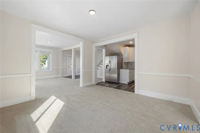 an empty room with a bathroom